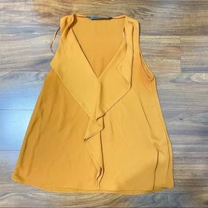Sleeveless mustard Trafaluc blouse